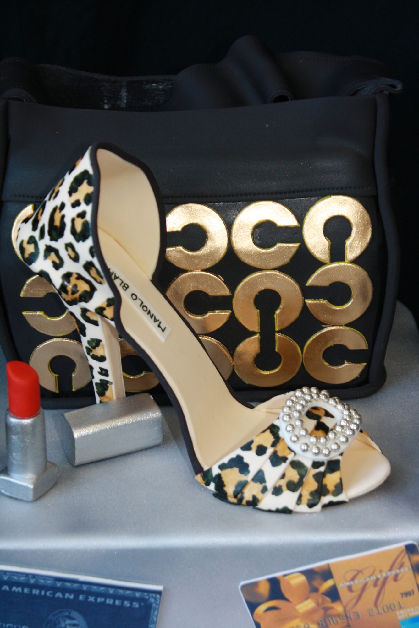Handbag and cheetah-print shoe cake